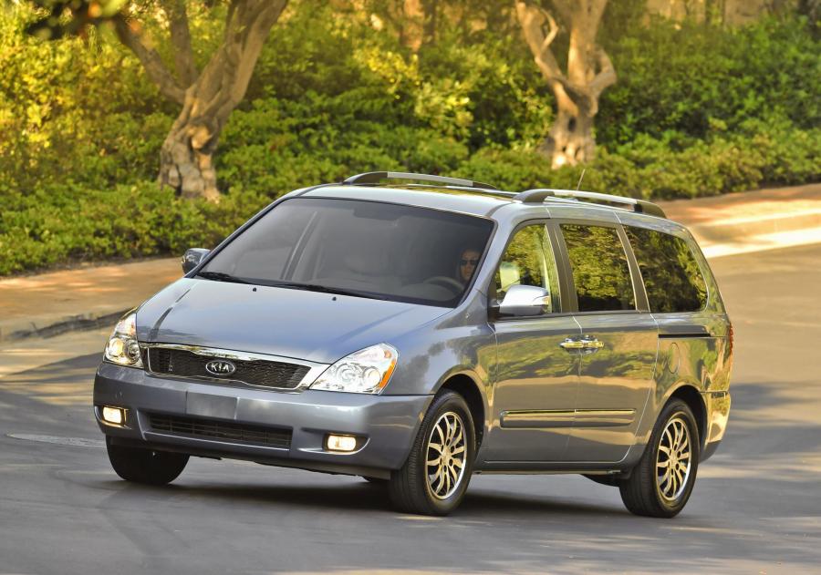 Kia Sedona 2010 года  (фото 35 из 54)